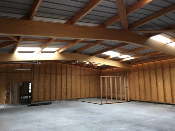 Cabinet médical rénové dans une maison individuelle avec ossature bois